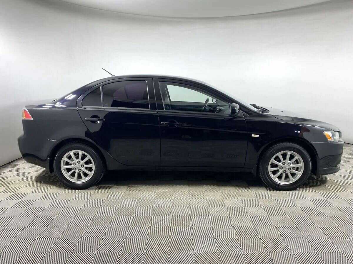 Mitsubishi Lancer с пробегом — 2012 год. Фото: #1