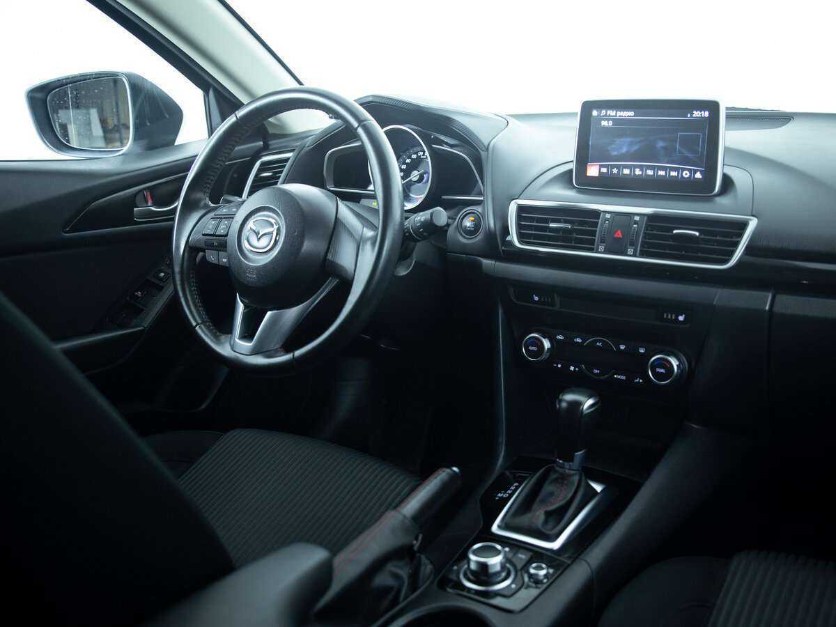 Mazda 3 с пробегом — 2014 год. Фото: #12
