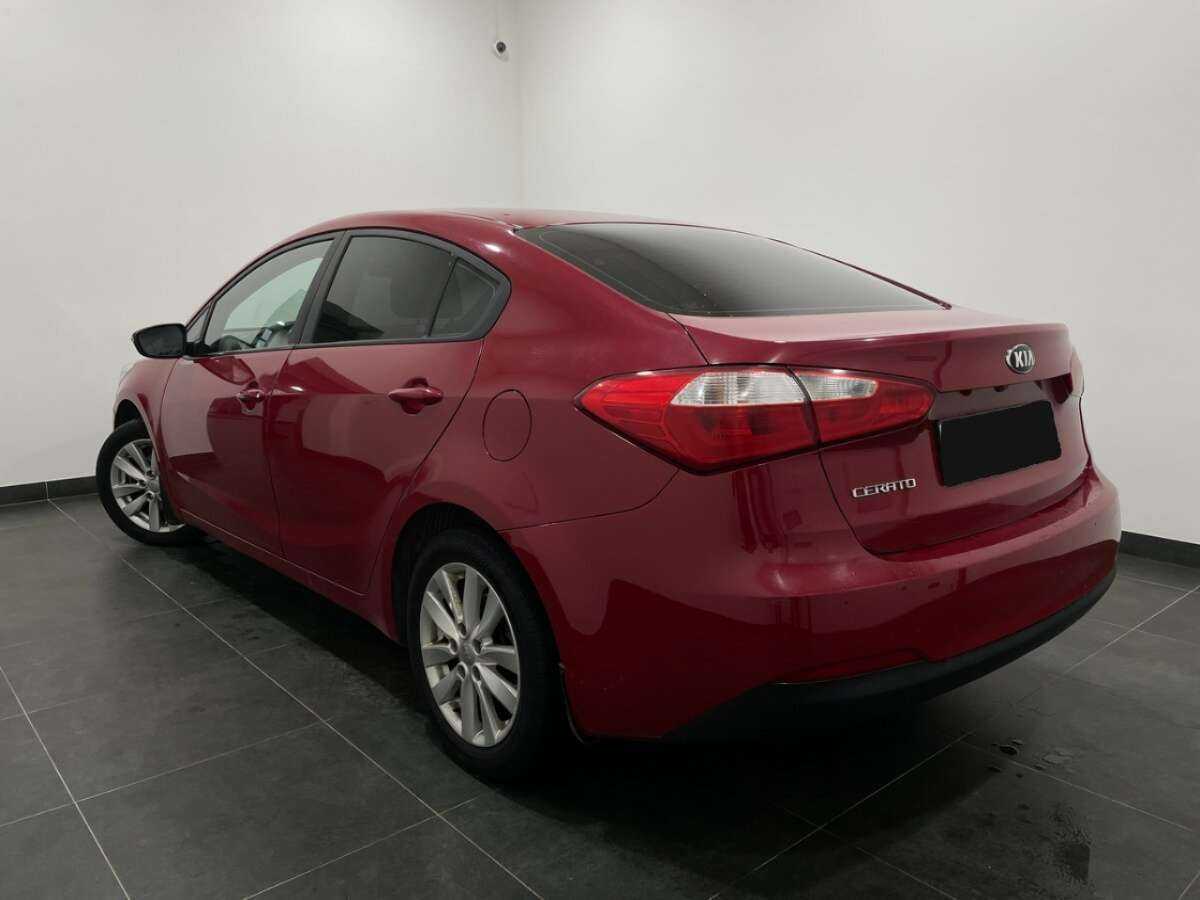Kia Cerato с пробегом — 2013 год. Фото: #2
