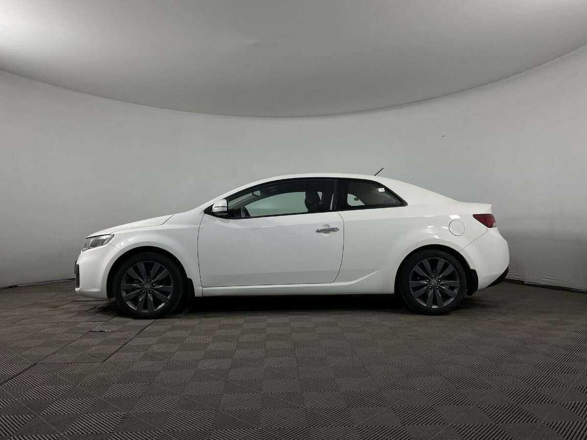 Kia Cerato с пробегом — 2012 год. Фото: #4