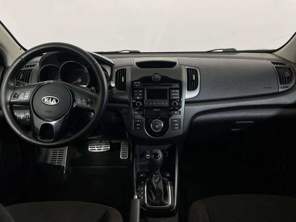 Kia Cerato с пробегом — 2012 год. Фото: #5