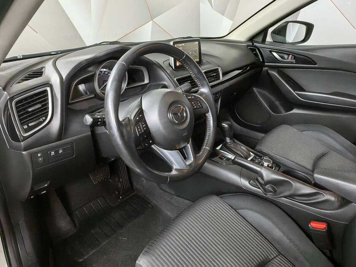 Mazda 3 с пробегом — 2014 год. Фото: #12