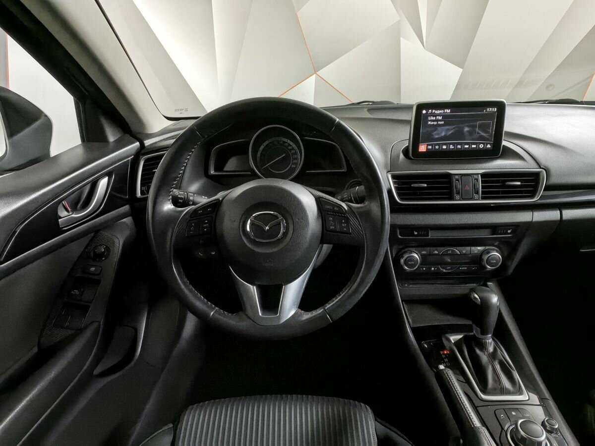 Mazda 3 с пробегом — 2014 год. Фото: #13