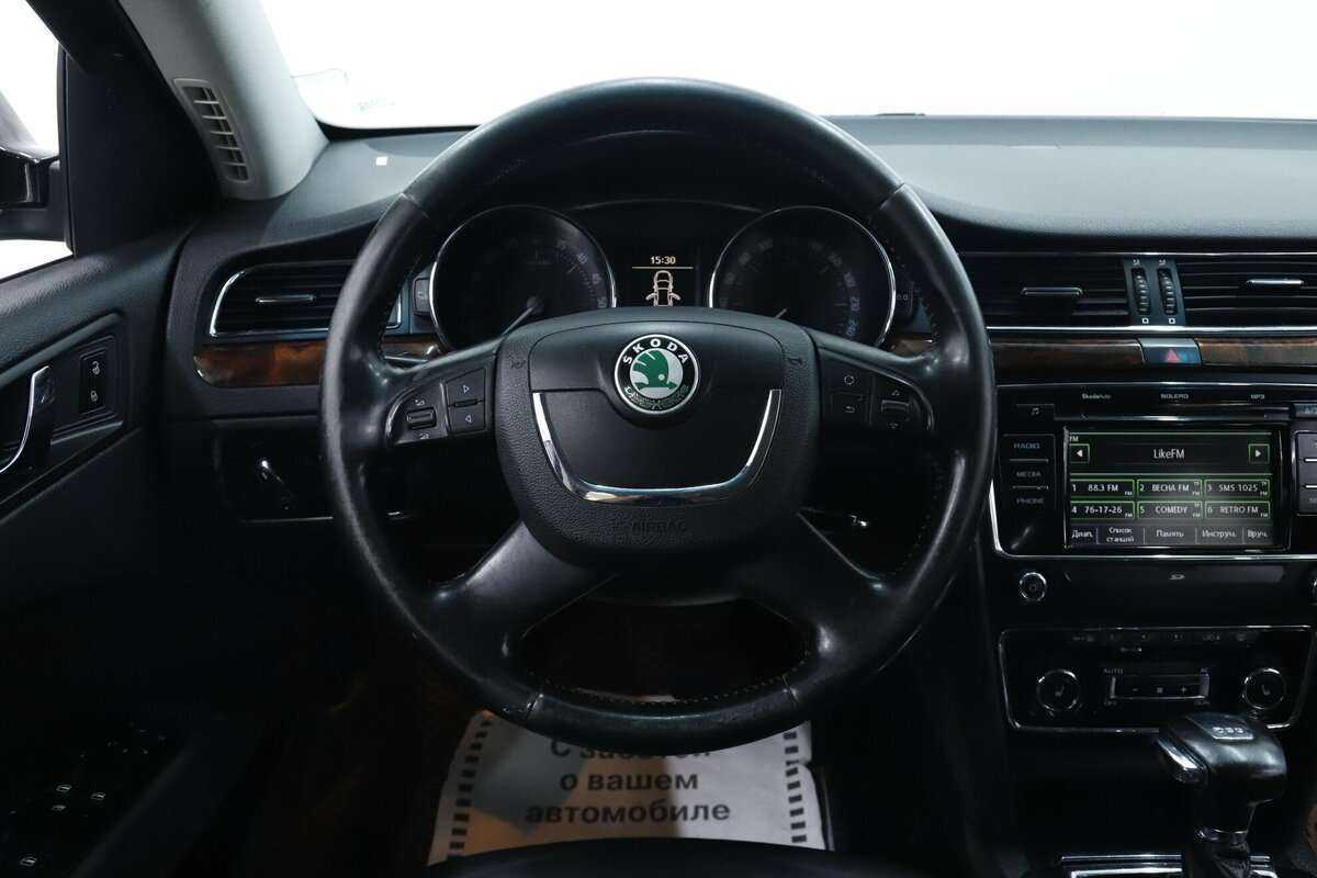 Skoda Superb с пробегом — 2013 год. Фото: #11