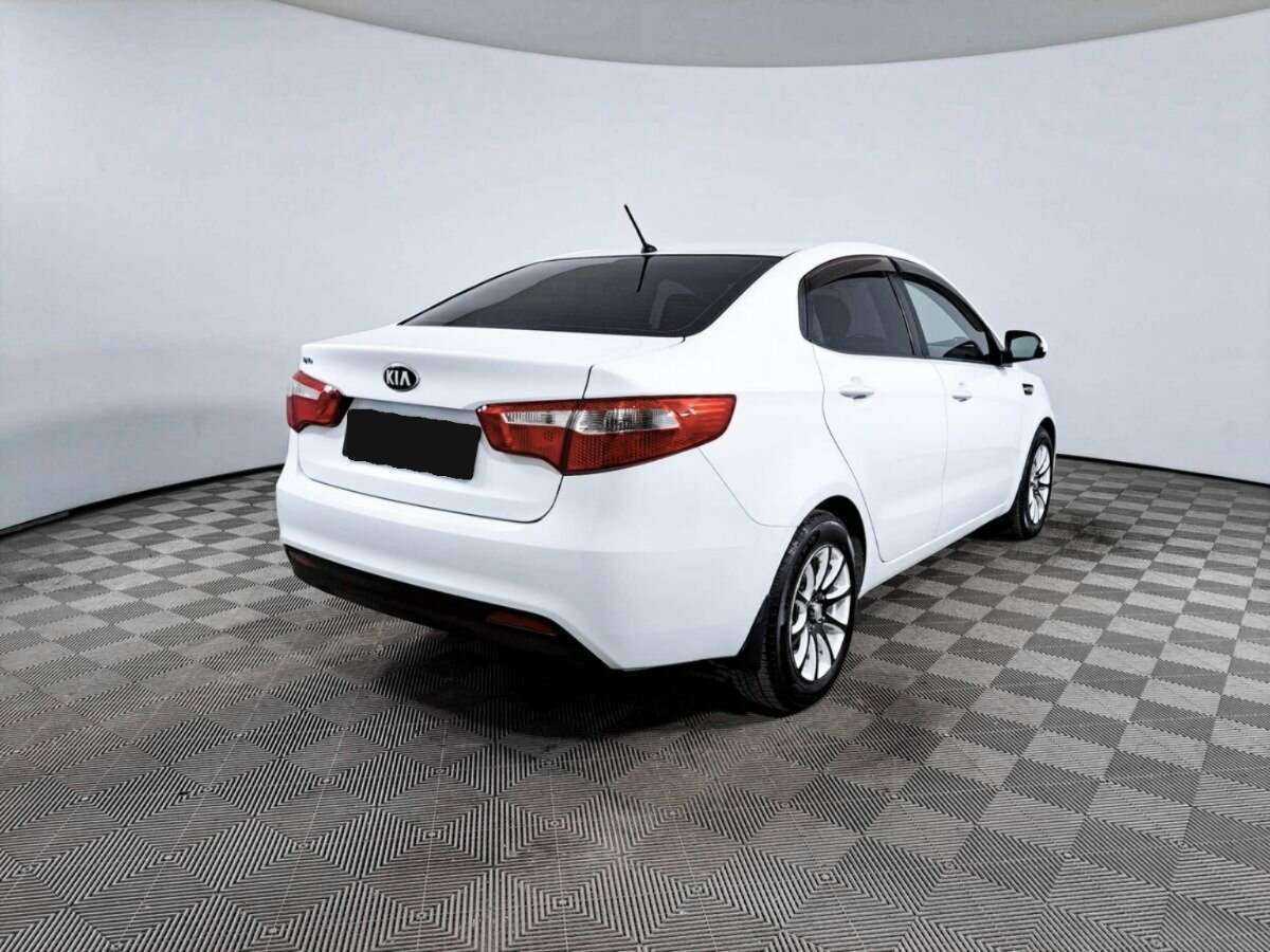 Kia Rio с пробегом — 2014 год. Фото: #4