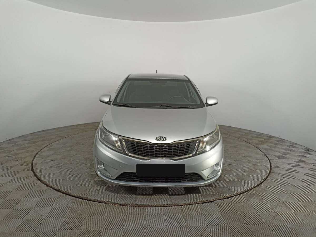 Kia Rio с пробегом — 2014 год. Фото: #1