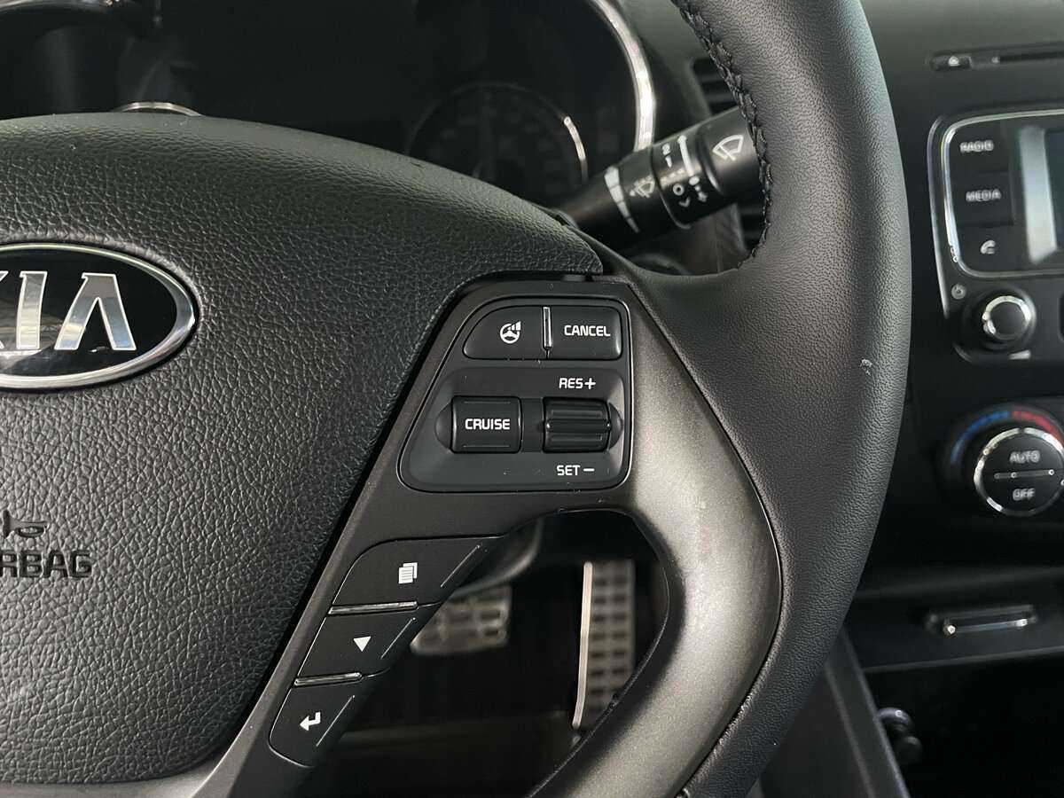 Kia Cerato с пробегом — 2014 год. Фото: #12