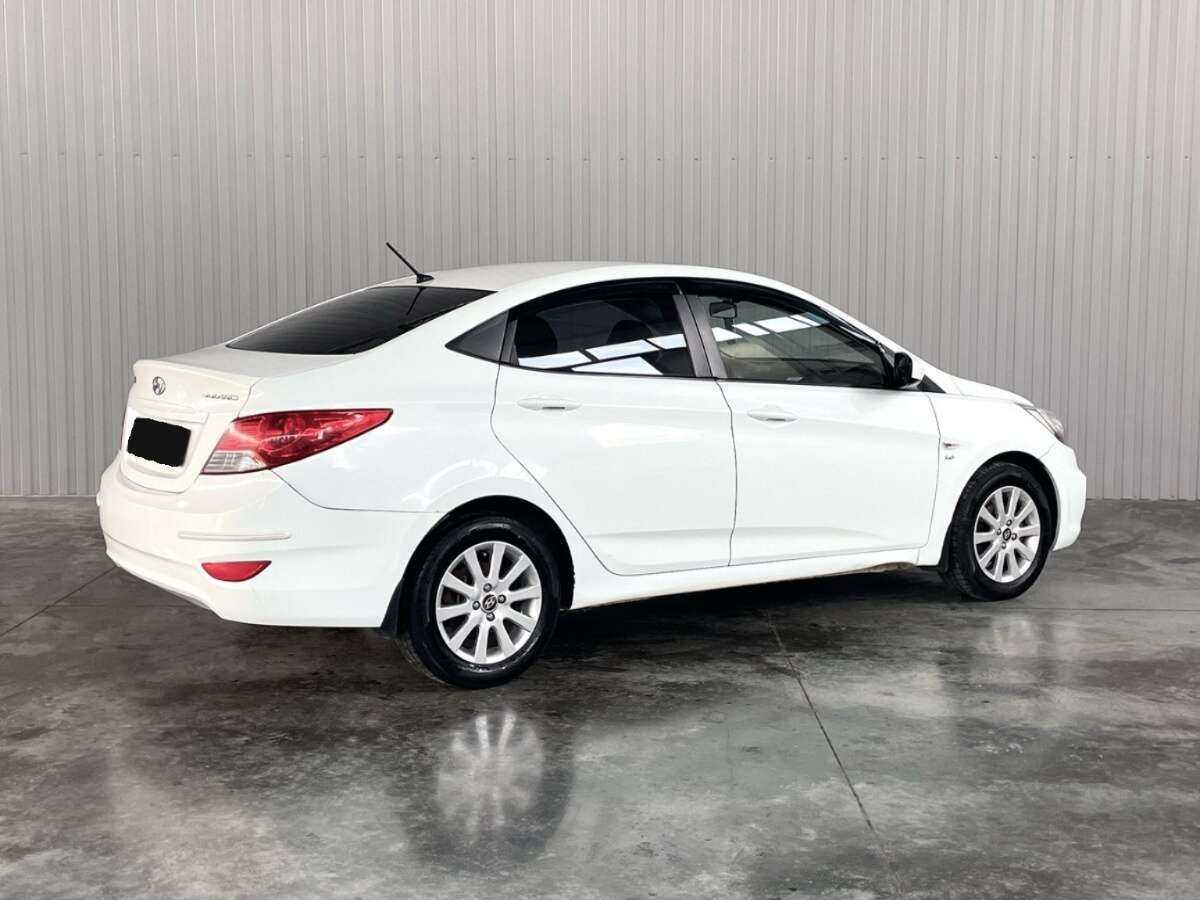 Hyundai Solaris с пробегом — 2013 год. Фото: #4