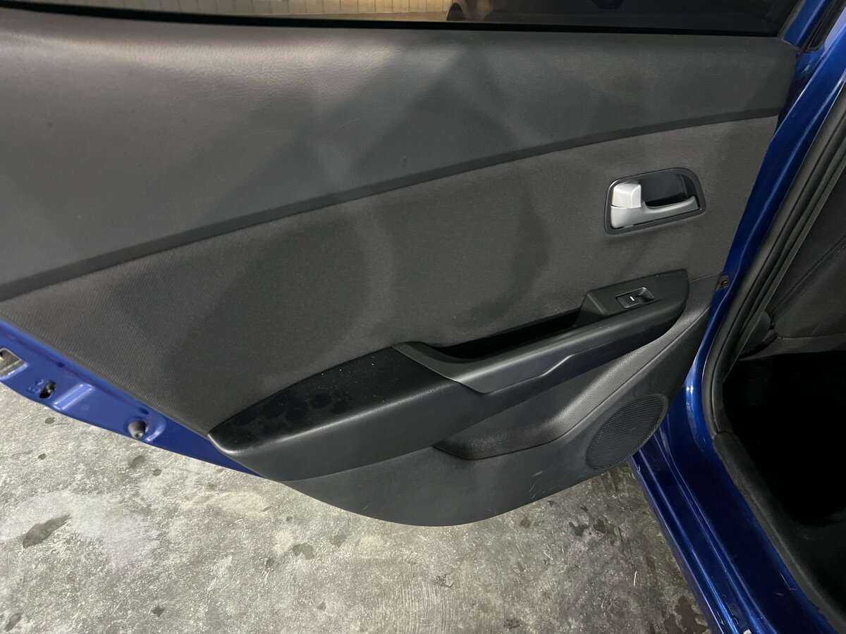 Kia Rio с пробегом — 2013 год. Фото: #10