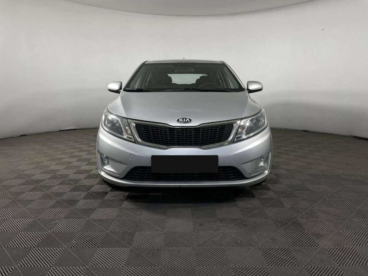 Kia Rio с пробегом — 2013 год. Фото: #1
