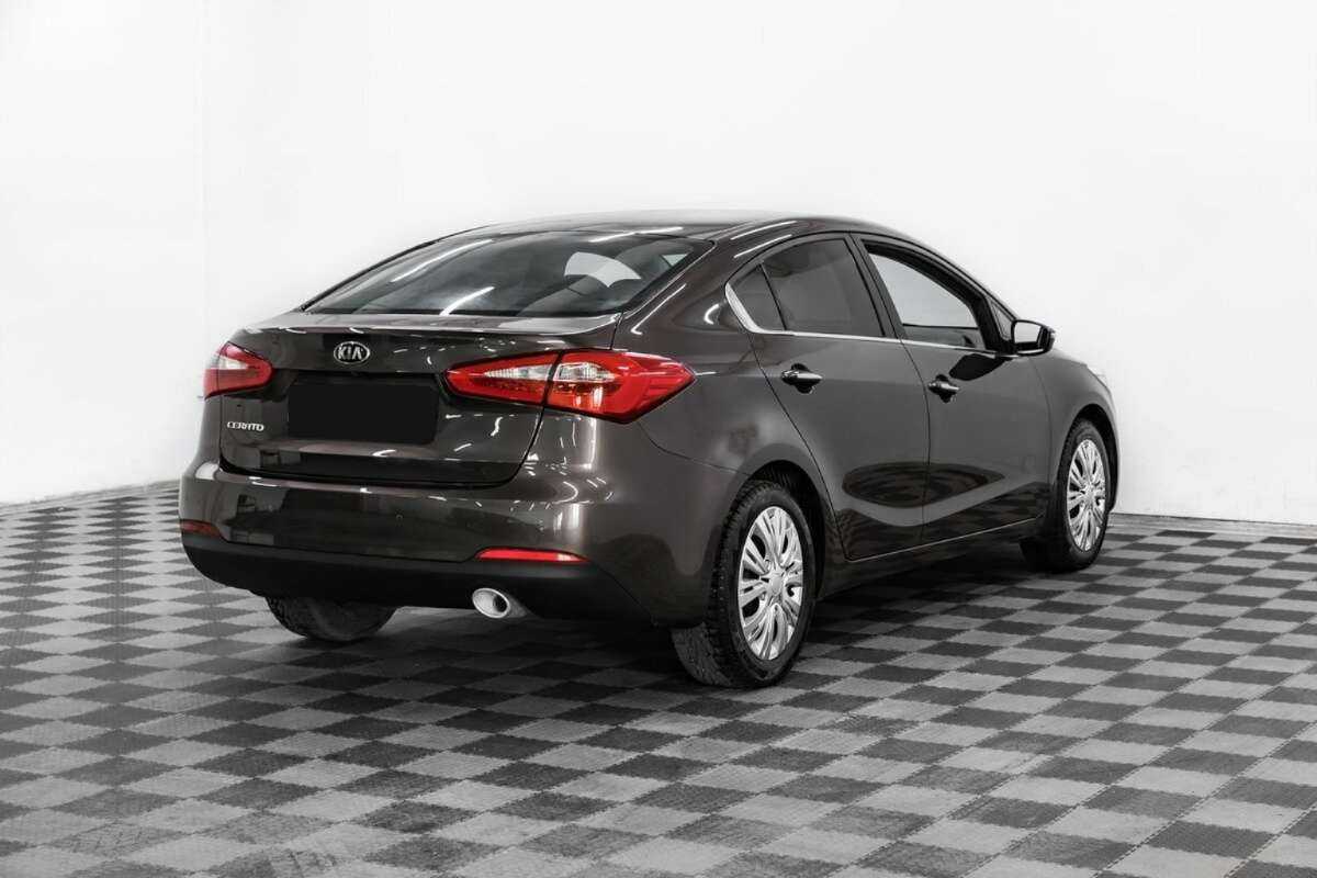 Kia Cerato с пробегом — 2013 год. Фото: #3