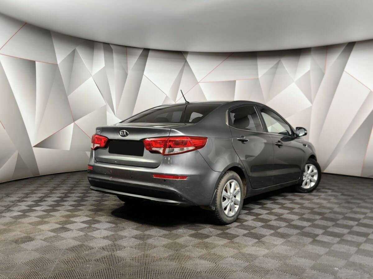 Kia Rio с пробегом — 2015 год. Фото: #1
