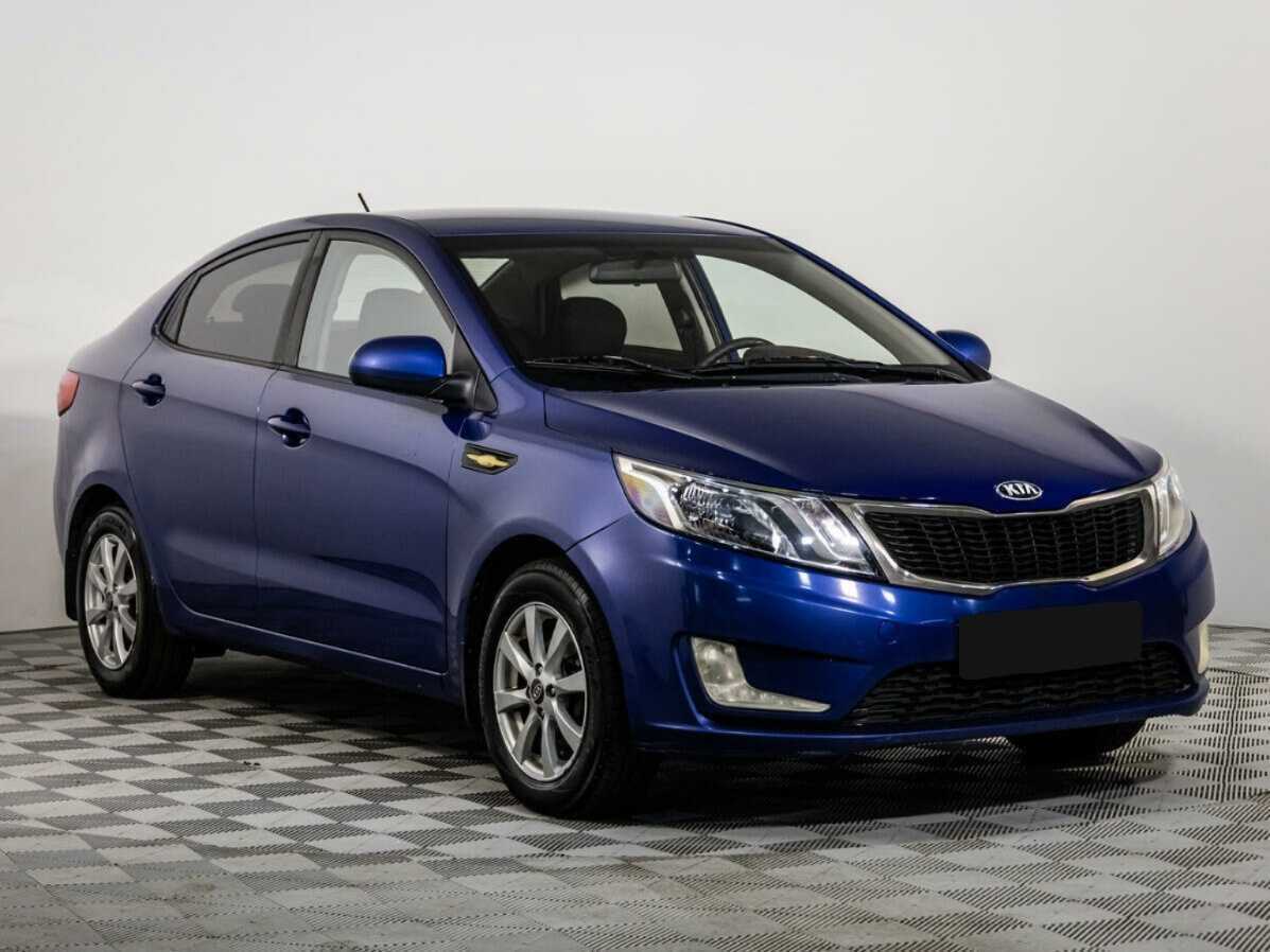 Kia Rio с пробегом — 2013 год. Фото: #1