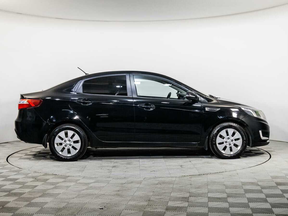 Kia Rio с пробегом — 2014 год. Фото: #2