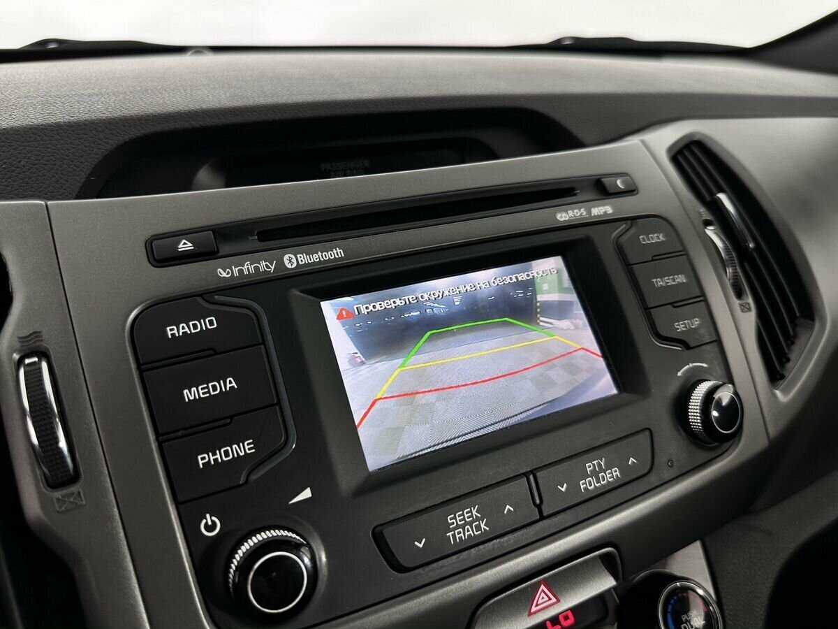 Kia Sportage с пробегом — 2014 год. Фото: #12