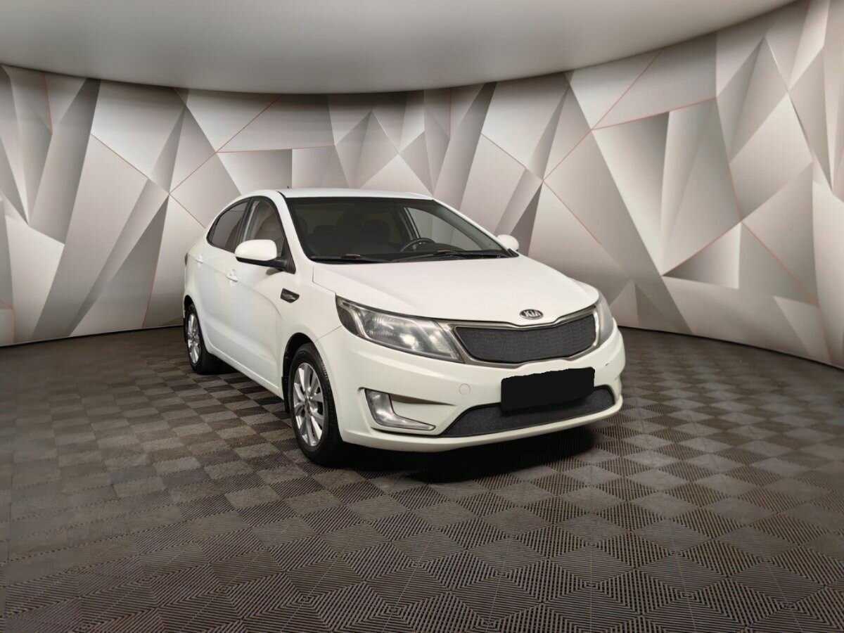 Kia Rio с пробегом — 2013 год. Фото: #2