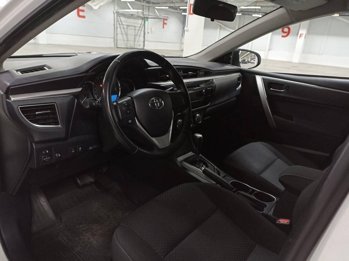 Toyota Corolla с пробегом — 2013 год. Фото: #15