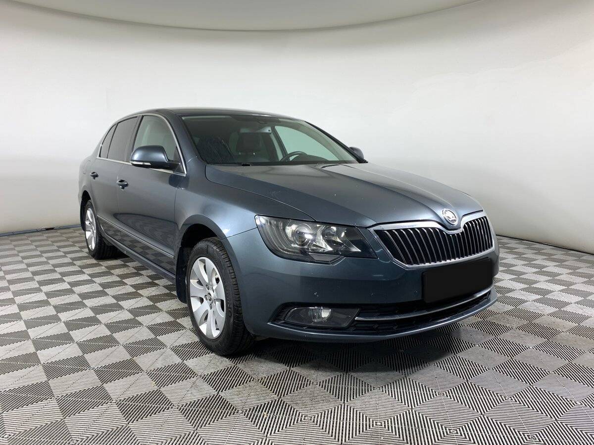 Skoda Superb с пробегом — 2014 год. Фото: #2