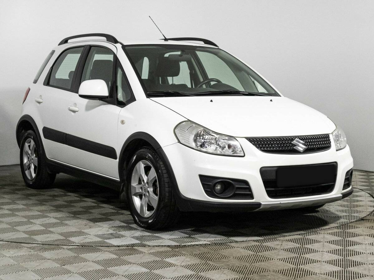 Suzuki SX4 с пробегом — 2013 год. Фото: #1