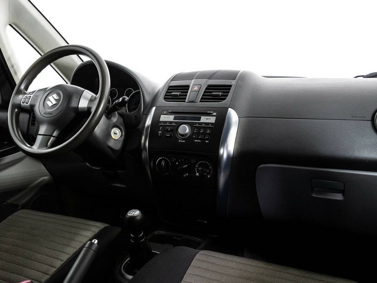 Suzuki SX4 с пробегом — 2012 год. Фото: #8
