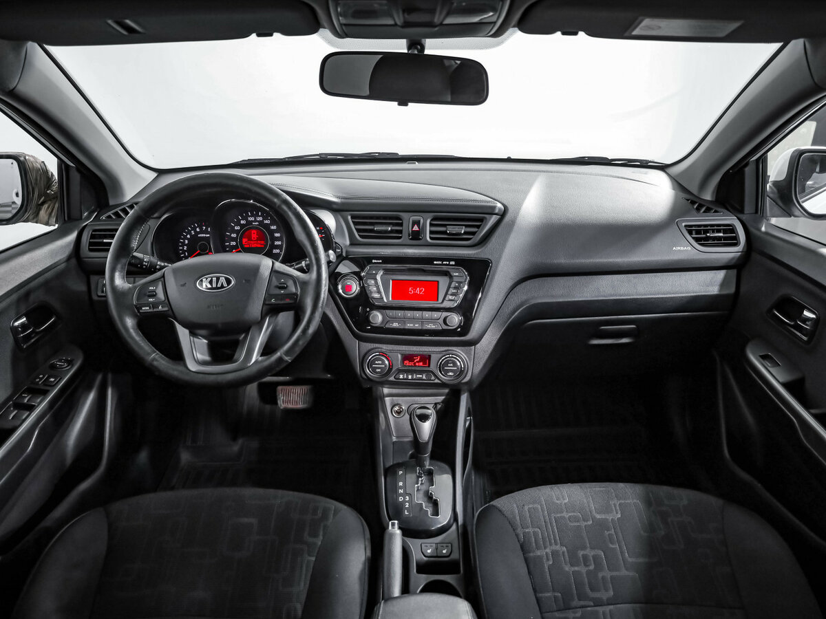 Kia Rio с пробегом — 2013 год. Фото: #7
